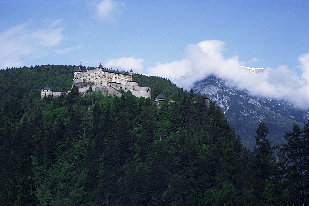 Castle in pine covered mountains near Salzburg, Austria, Europe