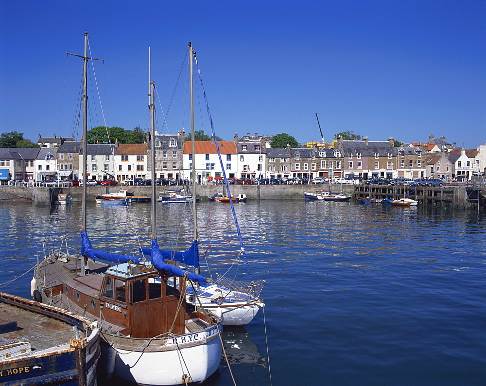 Boats on water and waterfront at Neuk of Fife, Anstruther, Scotland, United Kingdom, Europe