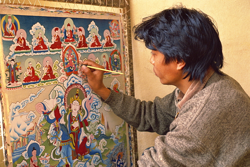 Head and shoulders of Thupten, a Tibetan thangka painter, tangka paintings are used in Buddhist meditation, in Kathmandu, Nepal, Asia