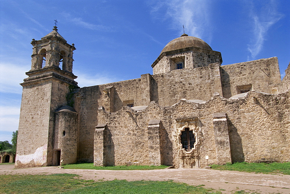 The walls, bell tower and dome of the San Jose Mission, the design of which is a model for other Missions in the area, at San Antonio, Texas, United States of America, North America