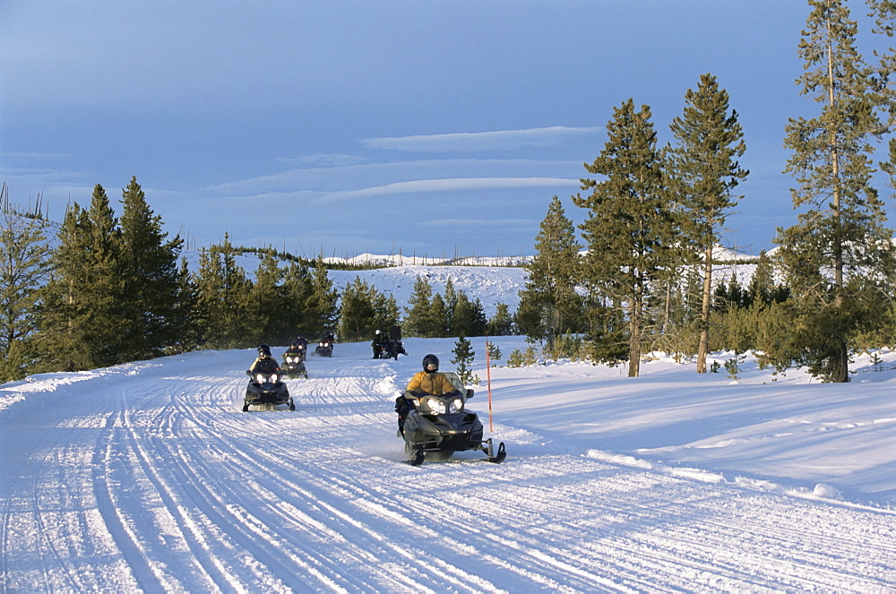 Snowmobiling in the western area of Yellowstone National Park, UNESCO World Heritage Site, Montana, United States of America, North America