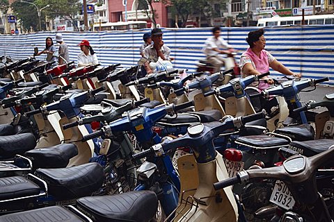 Rows of motorcycles parked in Ho Chi Minh City (Saigon), Vietnam, Indochina, Southeast Asia, Asia