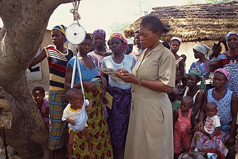 Weighing baby, Garinkuka Outreach aid project, Ghana, West Africa, Africa