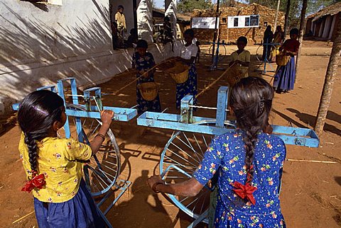 Girls spinning, India, Asia