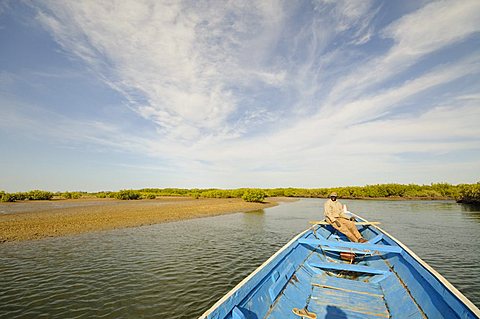 Pirogue or fishing boat on the backwaters of the Sine Saloum Delta, Senegal, West Africa, Africa