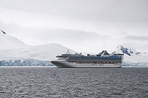 Ship sailing in the waters around the  Antarctic Peninsula, Antarctica, Polar Regions