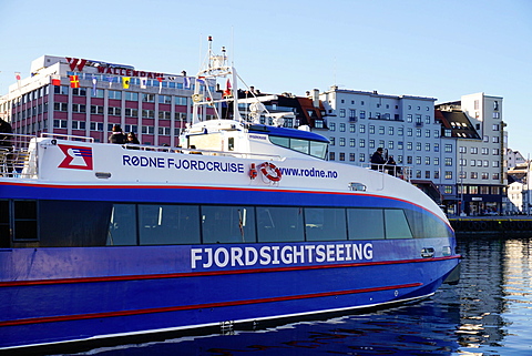 View on the harbour with tourist boat for touring Fjords, Bergen, Hordaland, Norway, Scandinavia, Europe