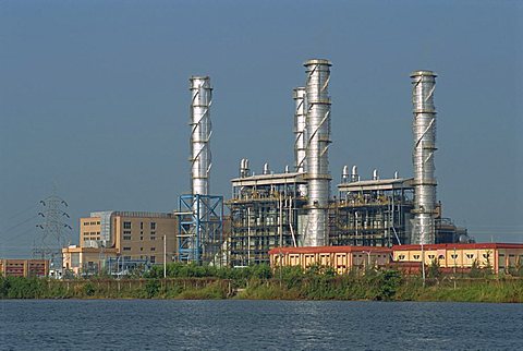 Chemical plant located on the Backwaters, Kerala state, India, Asia