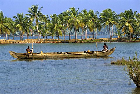 Collecting sand for building in the Backwaters, Kerala state, India, Asia