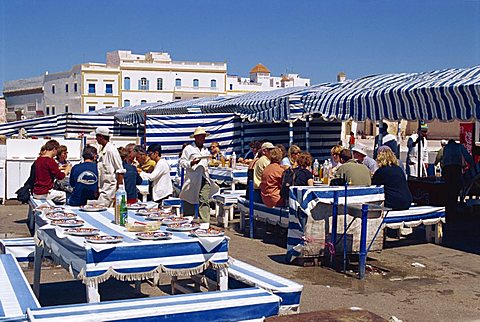 Open air fish restaurants and stalls by the sea to grill fresh fish, Essaouira, Morocco, North Africa, Africa