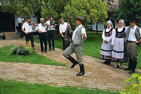 Folk dancing on horse farm in the Puszta, Hungary, Europe