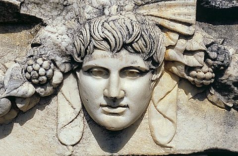 Detail of carved stone head, Aphrodisias, Anatolia, Turkey, Asia Minor, Asia