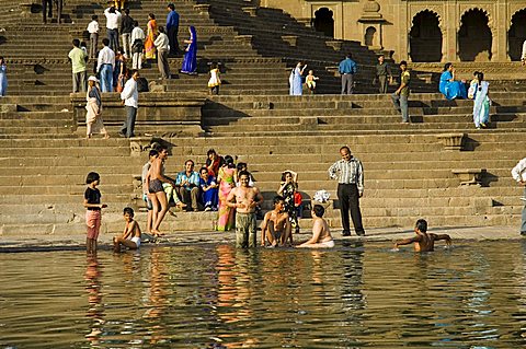 Ghats on the Narmada River at the Ahilya Fort and temple complex, Maheshwar, Madhya Pradesh state, India, Asia