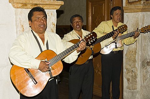 Guitarists play at the Camino Real Hotel, Oaxaca City, Oaxaca, Mexico, North America