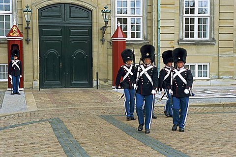 Changing the guard at the Royal Palace, Copenhagen, Denmark, Scandinavia, Europe