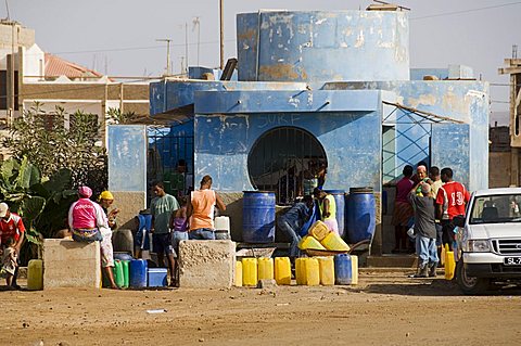 Collecting water from communal water facility, Sal (Salt), Cape Verde Islands, Africa