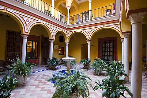 Typical riad style house now converted into Hotel Las Casas de la Juderia, Santa Cruz district, Seville, Andalusia, Spain, Europe