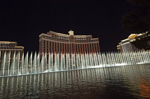 The Bellagio Hotel at night with its famous fountains, the Strip (Las Vegas Boulevard), Las Vegas, Nevada, United States of America, North America