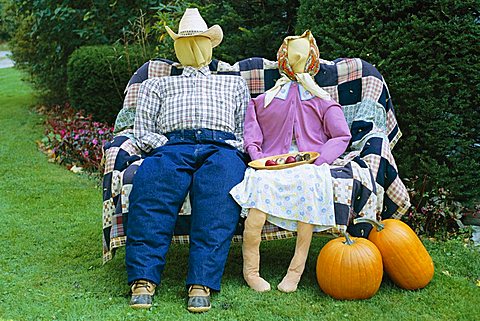 Strawdolls or scarecrows on a farm, Vermont, New England, United States of America (U.S.A.), North America