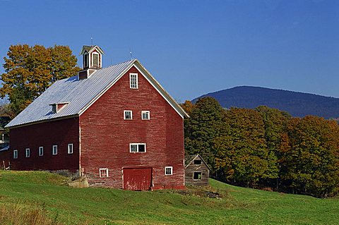 Exterior of a large barn, typical of the region, on a farm in Vermont, New England, United States of America, North America