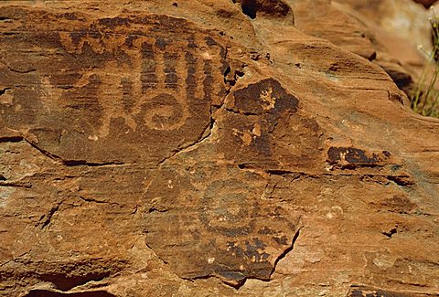 Petroglyphs drawn in sandstone by Anasazi indians around 500AD, Valley of Fire State Park, Nevada, USA