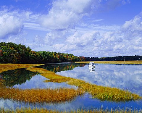 Still water reflecting the sky near Kennebunkport, Maine, New England, USA