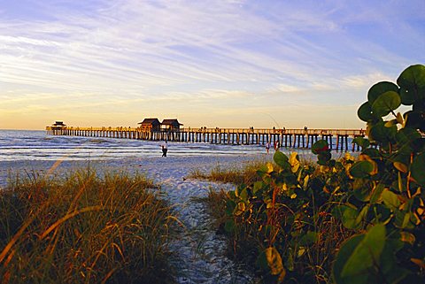 Naples, Florida, USA. Sunset at the beach and pier