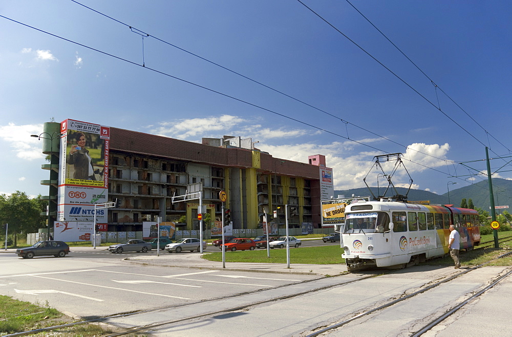 Tram and war damaged buildings, Sarajevo, Bosnia, Bosnia-Herzegovina, Europe