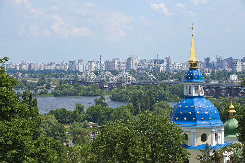 View of Vydubychi Monastery, looking over the Dnipro River to the residential area of Berezniaky, Kiev, Ukraine, Europe