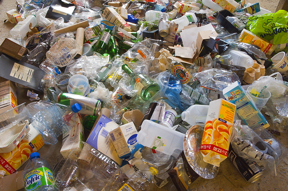 Bottles, plastic and cardboard await recycling, Builth Wells, Powys, Wales, United Kingdom, Europe