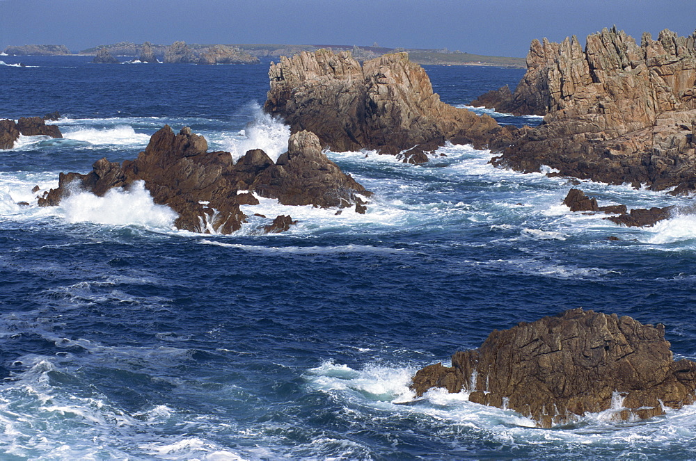 Sea pounding rocks on the coast on the Cote Sauvage on Ouessant Island, Brittany, France, Europe