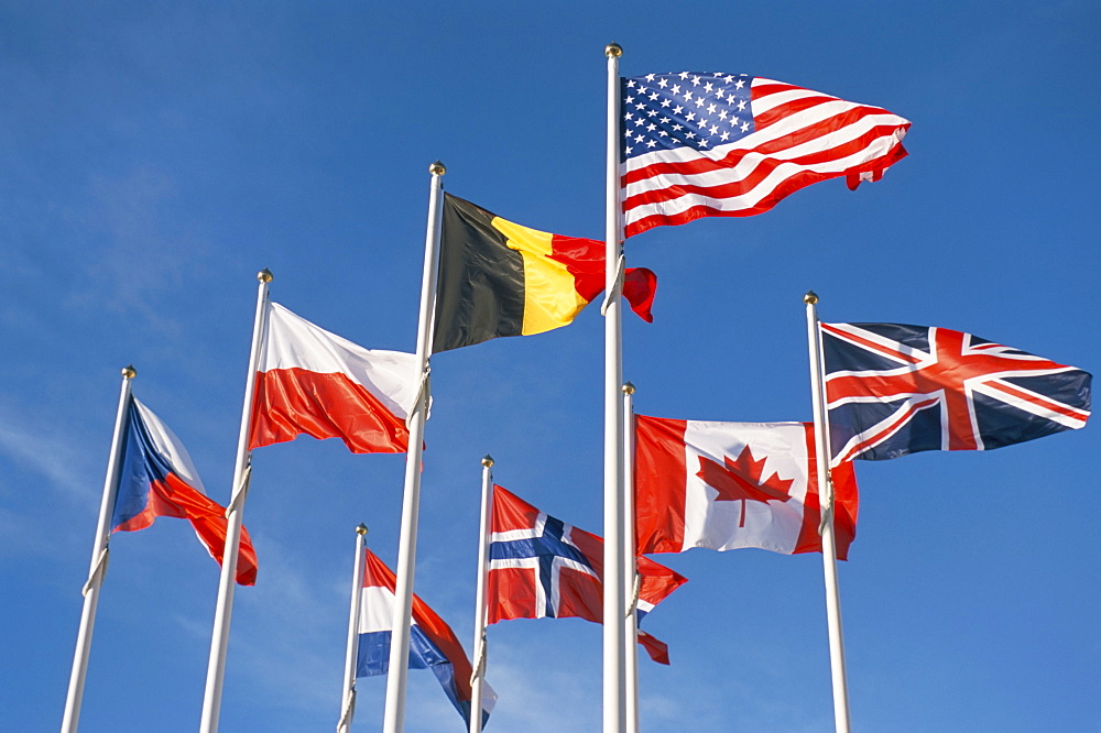 Allied forces flags flying at War Landing Beaches, Calvados, Normandy, France, Europe