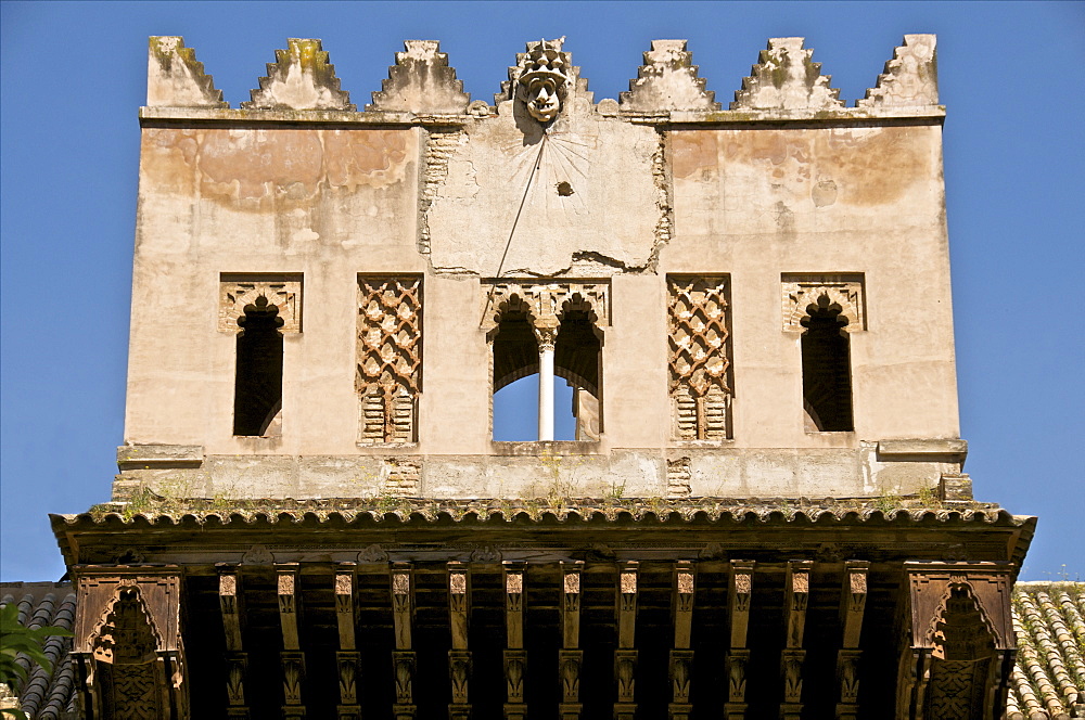 Sundial on mudejar gate and walls, Seville, Andalusia, Spain, Europe