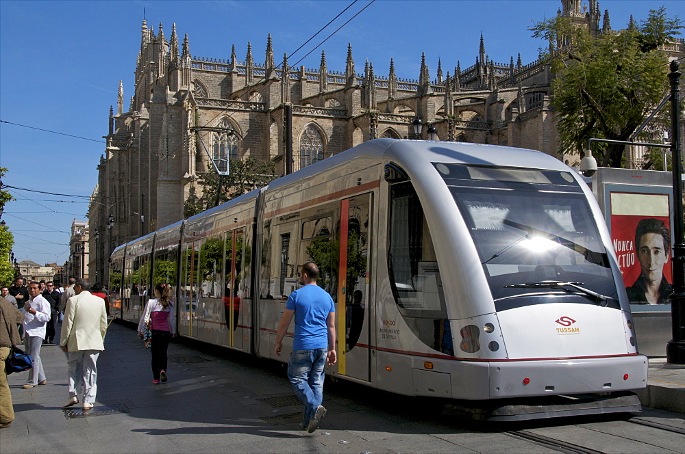 Tram on Constitucion Avenue and Cathedral in the background, Seville, Andalucia, Spain, Europe