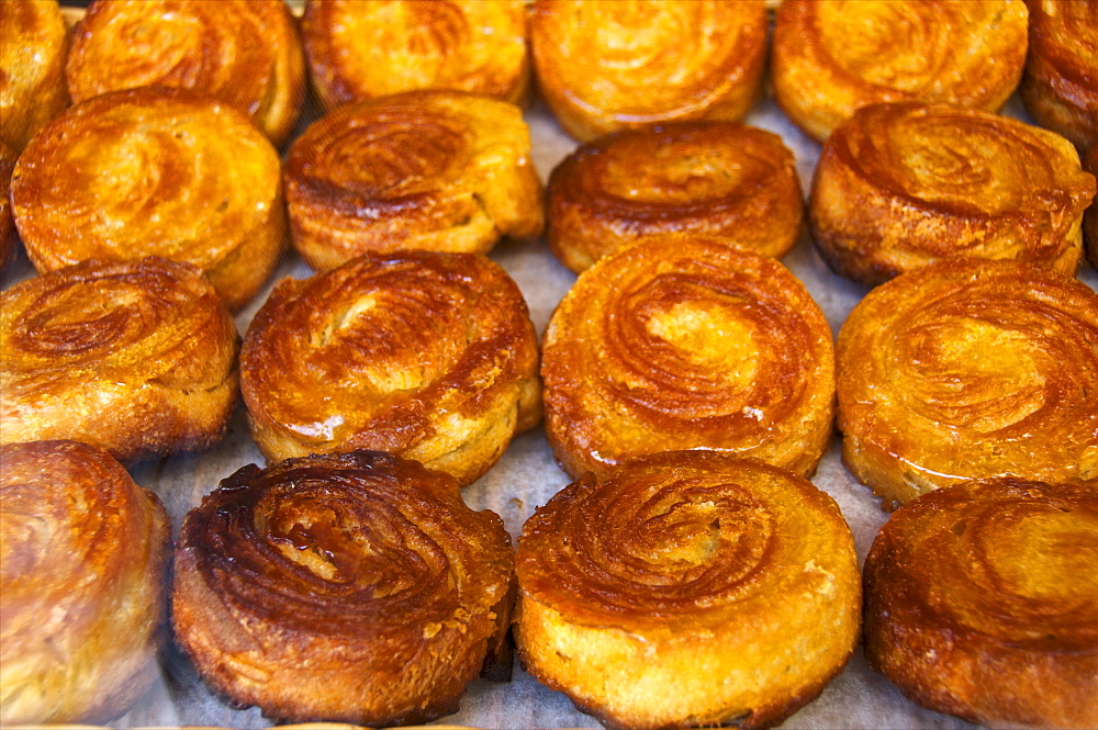 Typical Breton kouign-amann cakes, Dinan, Cotes d'Armor, Brittany, France, Europe