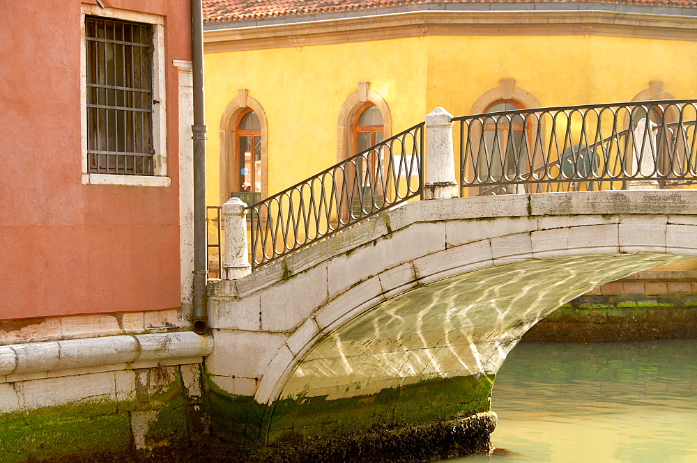 Bridge over canal with water reflections, Venice, UNESCO World Heritage Site, Veneto, Italy, Europe