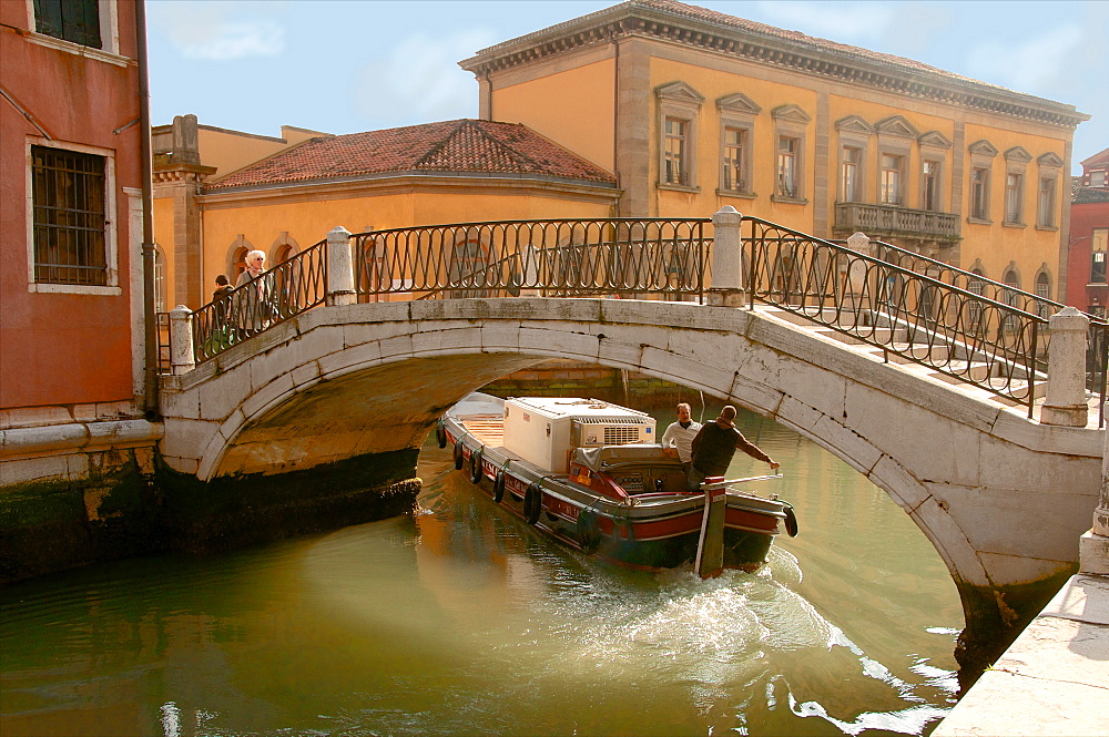 Bridge over canal with goods boat, Venice, UNESCO World Heritage Site, Veneto, Italy, Europe