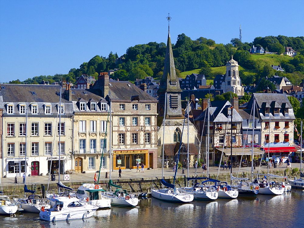 The Old Dock with pleasure boats moored, and St. Etienne Quay and church in the background, Honfleur, Auge, Normandy, France, Europe