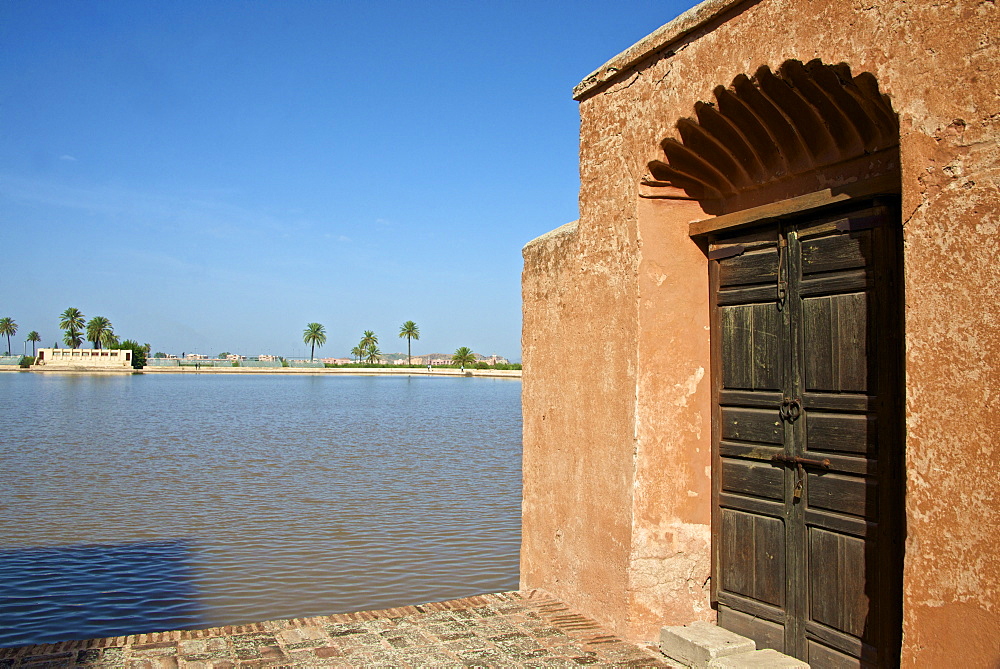 Water Basin dating from the 12th century Almohade period and Pavilion, Menara Gardens, Marrakech, Morocco, North Africa, Africa 