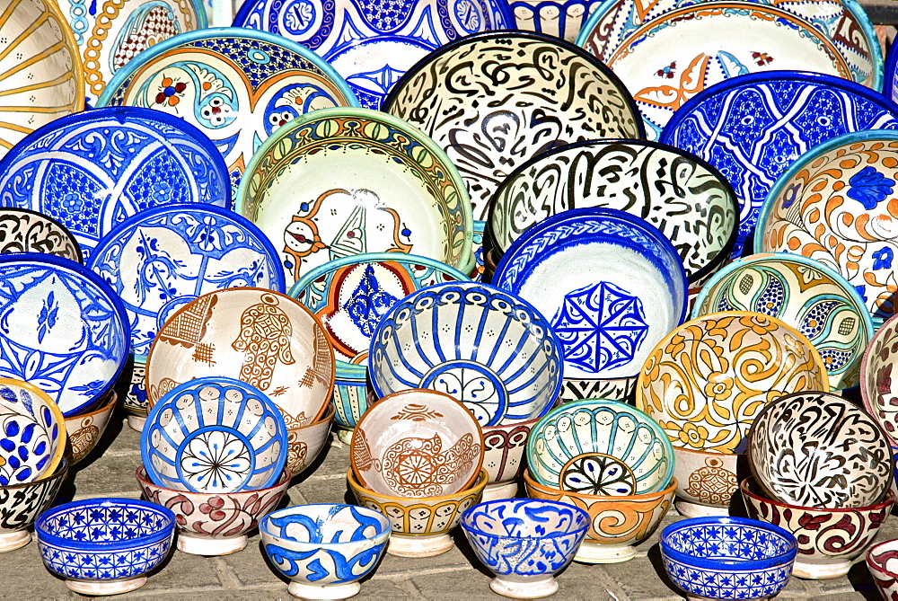 Earthenware plates and dishes from Fez, for sale in the street of the Medina,  Marrakech, Morocco, North Africa, Africa