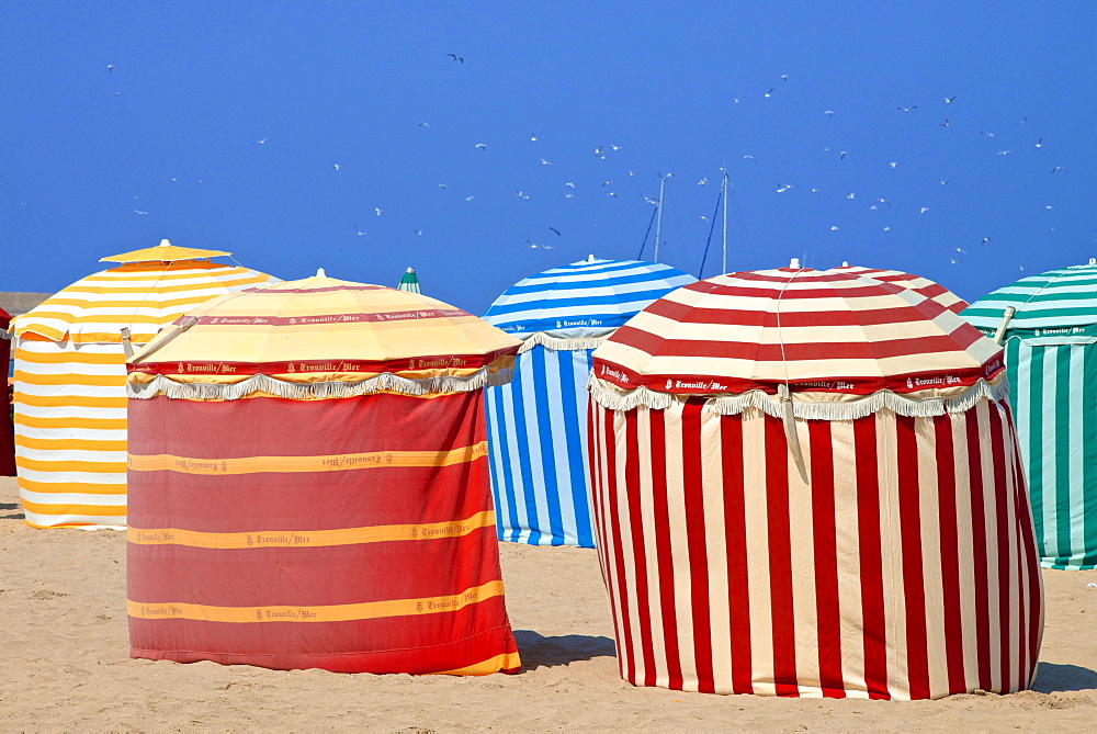 Typical color striped beach cabins, beach and sea, Trouville sur Mer, Normandy, France, Europe