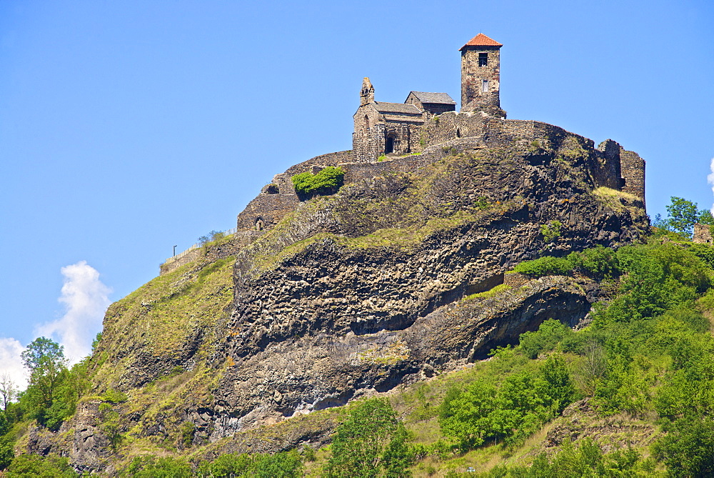 Medieval castle dating from the 15th century, and church of St. Madeleine, Saint Ilpize village, Haute Loire, France, Europe