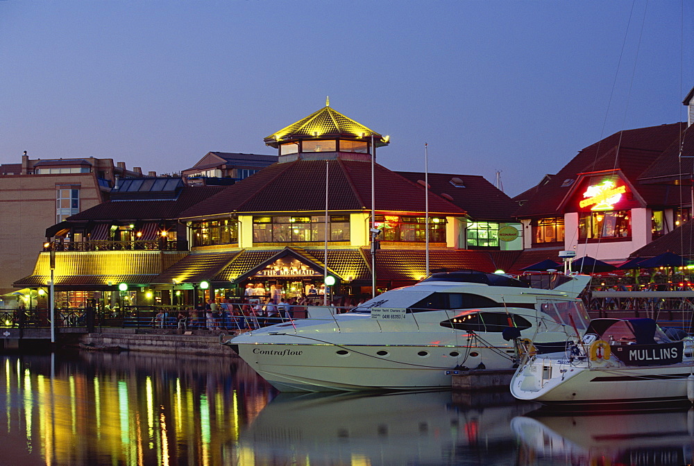 Boats and restaurants at dusk, Marina, Port Solent, Hampshire, England, United Kingdom, Europe