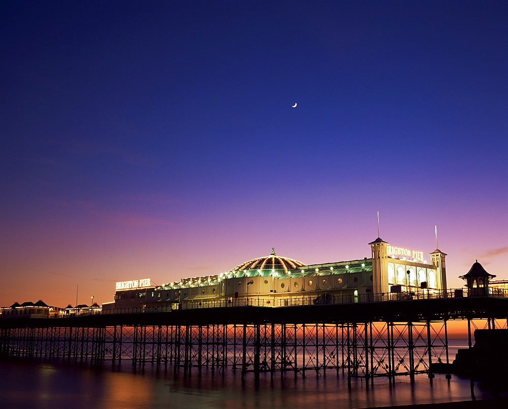 Brighton pier at twilight, Brighton, Sussex, England, United Kingdom, Europe