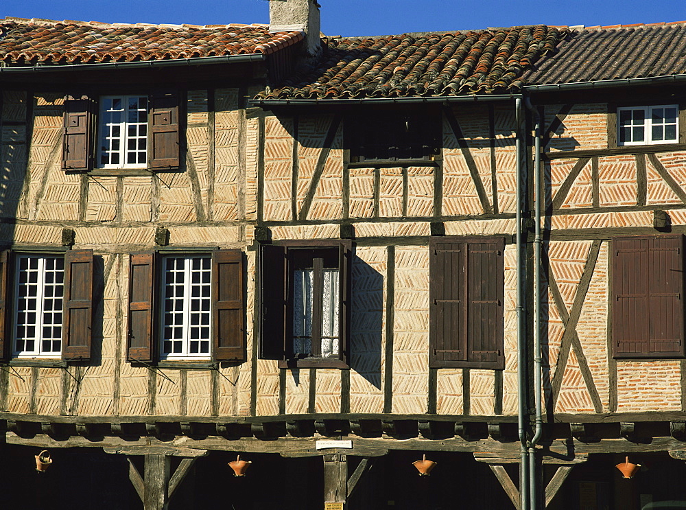 Exterior of timber framed houses with shutters, in Lautrec in Tarn, Midi-Pyrenees France, Europe