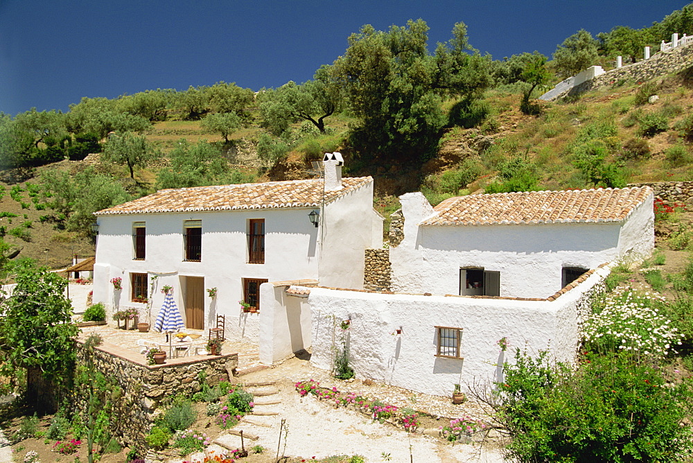 Exterior of a white walled house in the countryside near Malaga, Andalucia (Andalusia), Spain, Europe