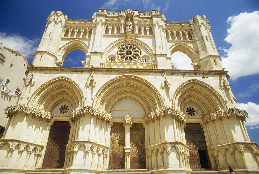 Low angle view of the exterior facade of the Christian cathedral at Cuenca in Castile la Mancha (Castilla la Mancha), Spain, Europe