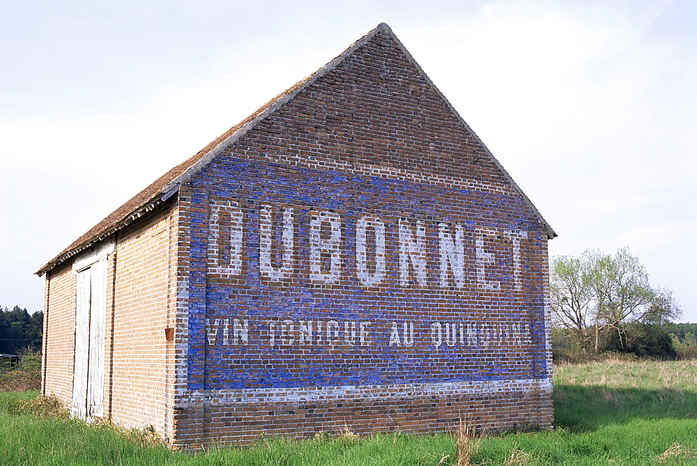 Advertisment sign on a wall, Midi Pyrenees, France, Europe