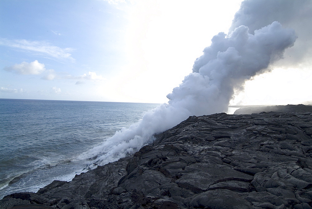 Steam plumes from hot lava flowing onto beach and into the ocean, Kilauea Volcano, Hawaii Volcanoes National Park, UNESCO World Heritage Site, Island of Hawaii (Big Island), Hawaii, United States of America, North America