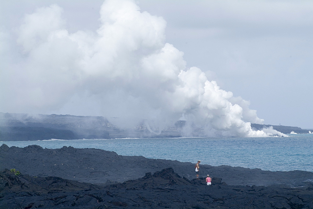 Steam plumes from hot lava flowing onto the beach and hitting the ocean, Kilauea Volcano, Hawaii Volcanoes National Park, UNESCO World Heritage Site, Island of Hawaii ('Big Island'), Hawaii, United States of America, North America